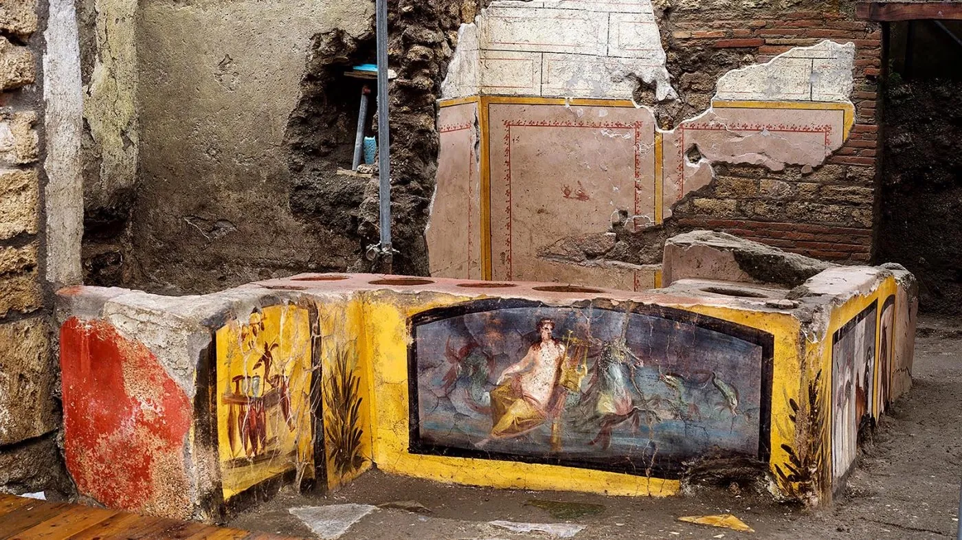 Wide view of the excavated Thermopolium of Regio V and its painted counter